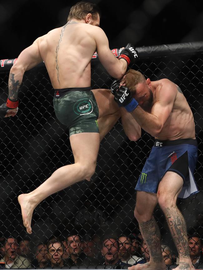 Conor McGregor lands a knee to the face of Donald Cerrone. Picture: Getty Images