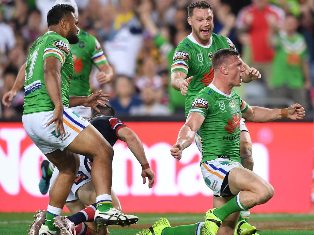 Jack Wighton of the Raiders celebrates with teammates after scoring a try during the 2019 NRL Grand Final between the Canberra Raiders and the Sydney Roosters at ANZ Stadium in Sydney, Sunday, October 6, 2019. (AAP Image/Joel Carrett) NO ARCHIVING, EDITORIAL USE ONLY