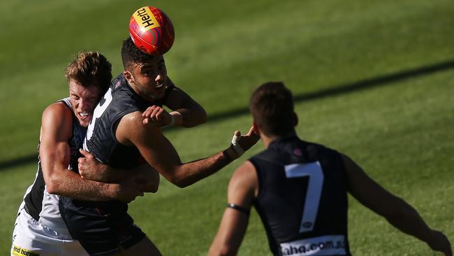 Christian Salem handballs to Viney.