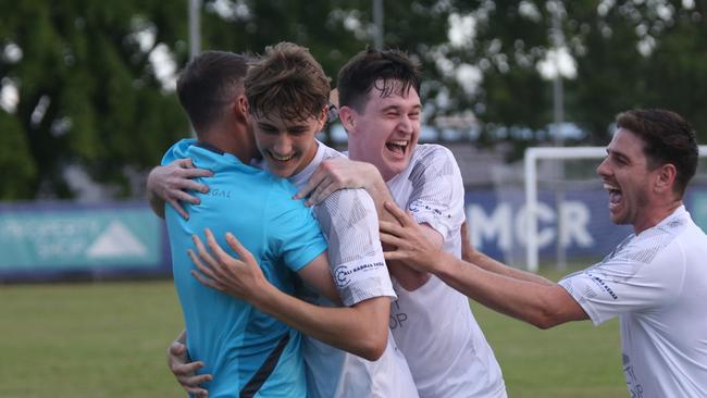 Cooper Kennedy celebrates goal with Marlin Coast coach Crios O'Hare and teammates. Marlin Coast Rangers v Edge Hill United Tigers at Pennell Field-Trinity Beach. FQPL Far North &amp; Gulf 2024. Photo: Gyan-Reece Rocha