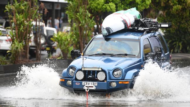 Downtown Byron Bay became a waterworld as hundreds of millimetres lashed the town.