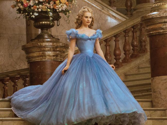 Belle of the ball ... Lily James floats down the stairs in the scene that marked her Cinderella graduation Picture: Disney