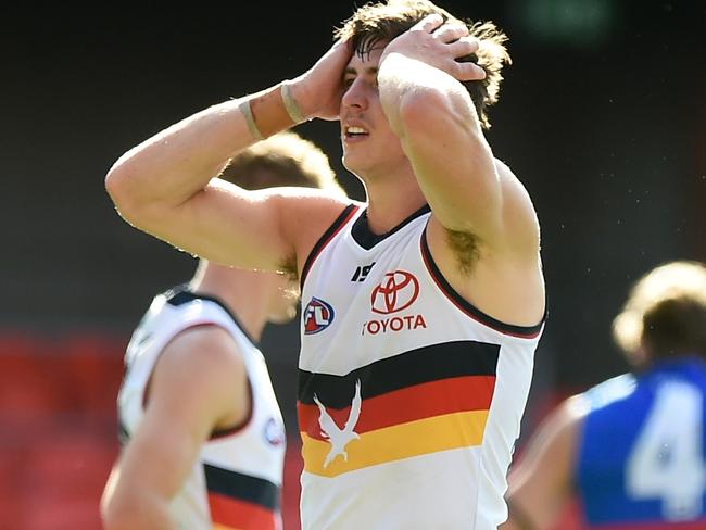 GOLD COAST, AUSTRALIA - AUGUST 16: Jake Kelly of the Crows looks dejected during the round 12 AFL match between the Western Bulldogs and the Adelaide Crows at Metricon Stadium on August 16, 2020 in Gold Coast, Australia. (Photo by Matt Roberts/AFL Photos/via Getty Images)