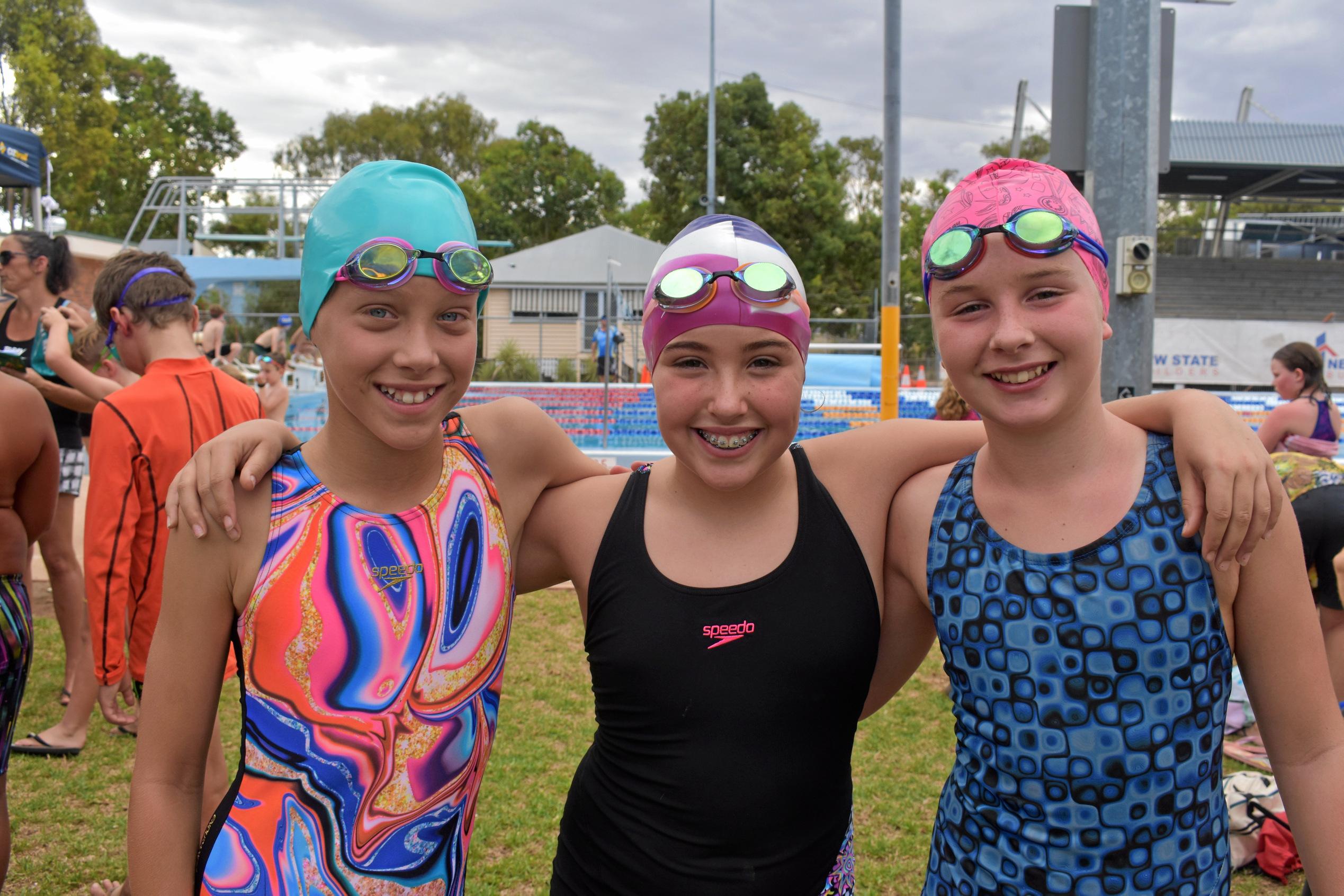 Local swimmers go head to head | The Courier Mail