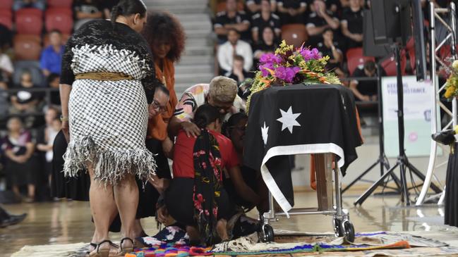 Mourners pay their final respects to the late Dr Bush Blanasi at his state funeral on Friday, December 15.