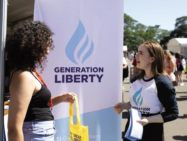 Generation Liberty campus coordinator Laura Glase, right, at a stall at the University of Sydney. Supplied