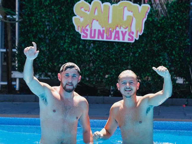 Working backpackers Kieran Campbell(L) and Harvey Preece enjoying the Top End lifestyle in the Covid 19 era.Picture GLENN CAMPBELL