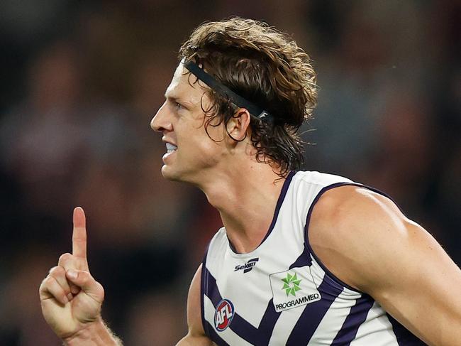 MELBOURNE, AUSTRALIA - JULY 09: Nat Fyfe of the Dockers celebrates a goal during the 2022 AFL Round 17 match between the St Kilda Saints and the Fremantle Dockers at Marvel Stadium on July 09, 2022 in Melbourne Australia. (Photo by Michael Willson/AFL Photos via Getty Images)