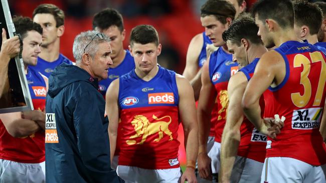 Lions Coach Chris Fagan talks to his team during Brisbane’s loss to Richmond. Picture: Jono Searle/AFL Photos/via Getty Images