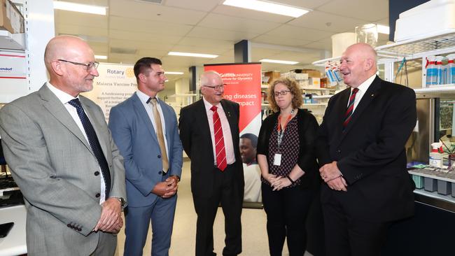 Griffith University Vice Chancellor Professor Ned Pankhurst, Glycomics GM Chris Davis, Professor Graham Jones, Dr Danielle Stanisic with Governor General Sir Peter Cosgrove for an update on the latest developments surrounding the groundbreaking malaria vaccine trial currently in clinical stage. Photograph: Jason O'Brien