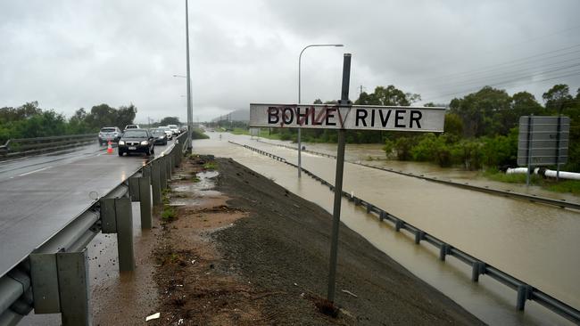 Flooding across Townsville. Lower Bridge closed on the Bohle River as overflow covers the road. Picture: Alix Sweeney