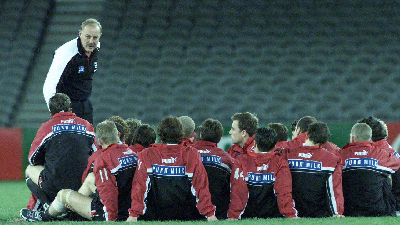 Malcolm Blight addresses the Saints players after a game.