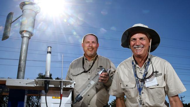 Radar Lead Mike Hanslow and Surface Networking Lead Robert Michelini at the automatic weather station at the new Bureau of Meteorology's Observing Operations Hub in Cairns PICTURE: ANNA ROGERS