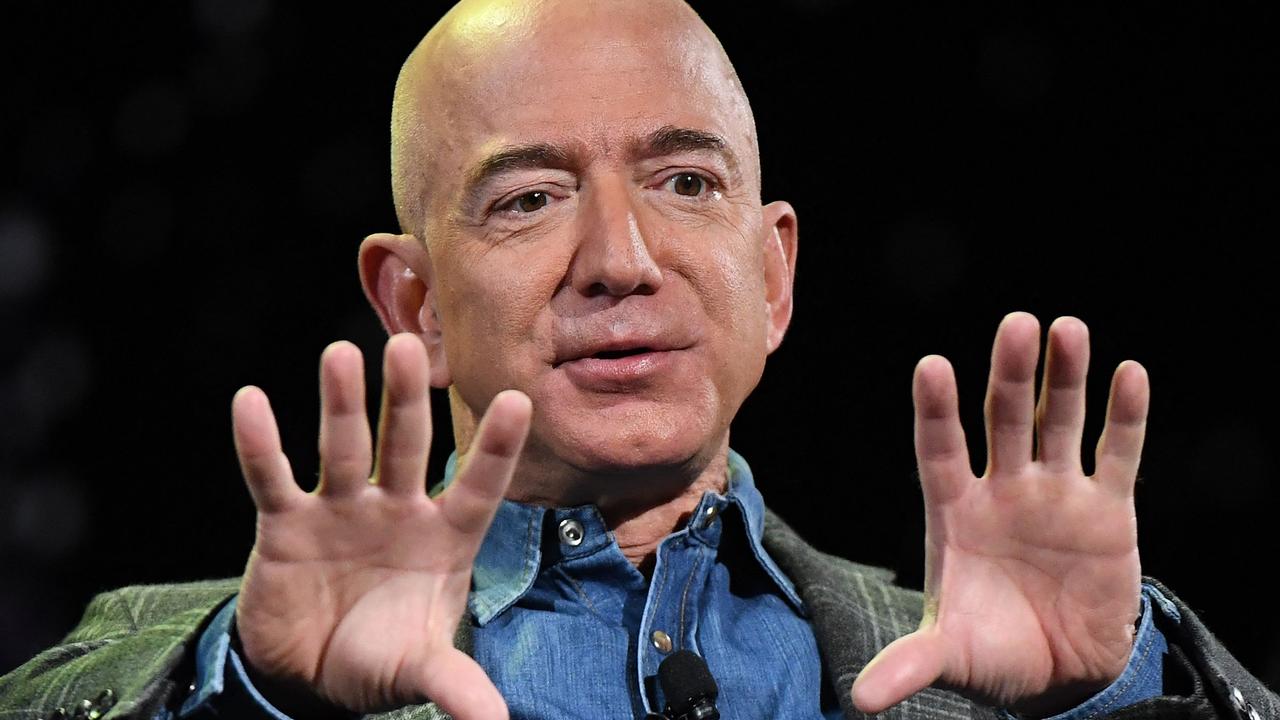 He is expected to dedicate more time toward initiatives like the Bezos Earth Fund, his Blue Origin spaceship company. Picture: Mark Ralston / AFP