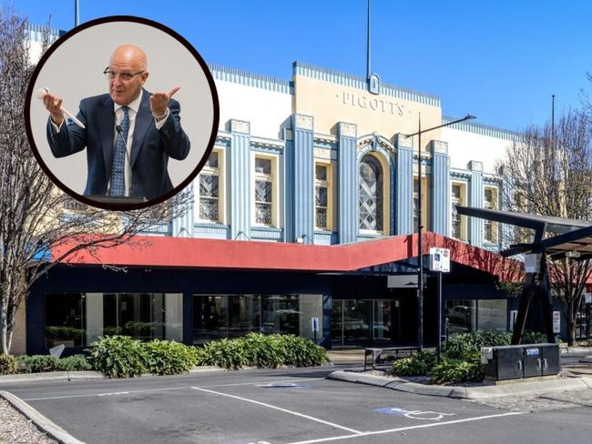 Million-dollar bids placed at auction for historic CBD building