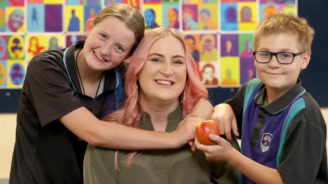 Gawler District College students Grace, 13 and Noah Lang, 12, thank their teacher Jenna Cale. Picture: Kelly Barnes