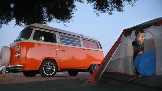 Camped at the Foreshore Caravan Park, Paul finds a quiet early morning moment to knock out a few words, before heading into town, to gauge local opinion on the upcoming Voice referendum. Picture: Dean Martin