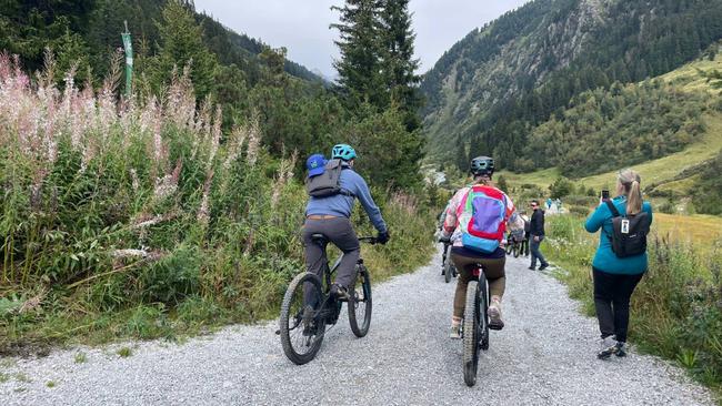 Riding e-bikes through the Verwall Valley. Picture: Simone Mitchell