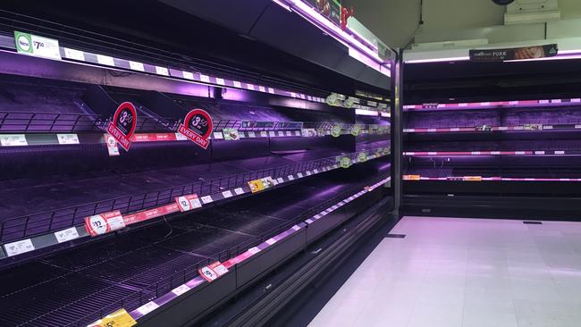 Empty supermarket cool-goods shelves. Picture: Matt Loxton