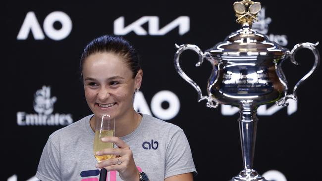 Ash Barty celebrated her Australian Open win with a glass of champagne. Picture: Mark Metcalfe/Getty Images