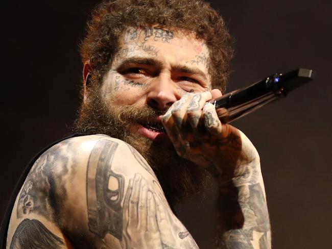 DAILY TELEGRAPH NOVEMBER 29, 2023. Post Malone on stage during his concert at The Domain in Sydney. Picture: Jonathan Ng