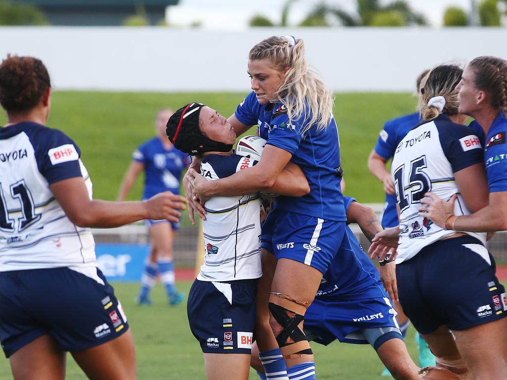 Cairns product Tahlullah Tillett is hit hard by Diehards' Kody House in the QRL BHP Premiership match between the North Queensland Gold Stars and the Valleys Diehards, held at Barlow Park. Picture: Brendan Radke