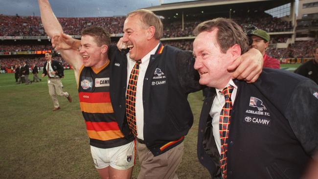 Malcolm Blight celebrated Adelaide’s premiership in 1997 with Mark Bickley.