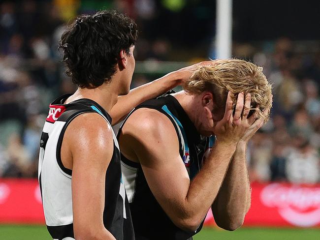 ADELAIDE, AUSTRALIA - SEPTEMBER 05: Jason Horne-Francis of the Power and Jase Burgoyne of the Power after the loss during the 2024 AFL Second Qualifying Final match between the Port Adelaide Power and the Geelong Cats at Adelaide Oval on September 05, 2024 in Adelaide, Australia. (Photo by Sarah Reed/AFL Photos via Getty Images)