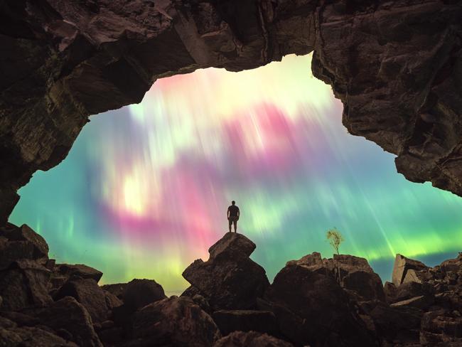 EMBARGO FOR TWAM, 12 OCTOBER 2024. FEE MAY APPLY. ONE TIME USE ONLY. Matt David pictured watching the recent aurora. Photo: Matt Davis