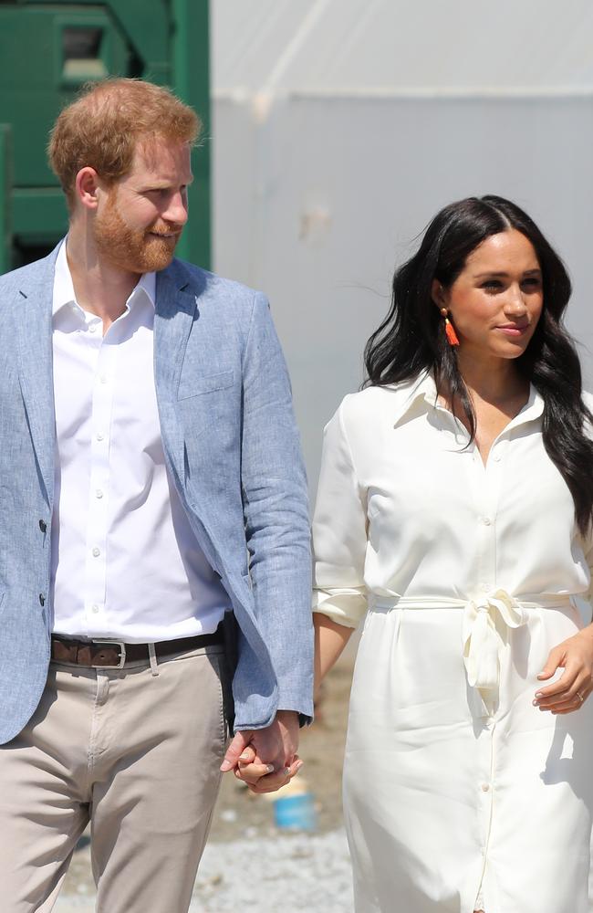 The media were called out by Prince Harry for their treatment of Meghan Markle during the end of their royal tour through Africa. Photo: Chris Jackson