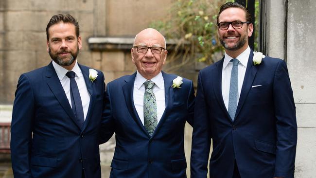 Rupert Murdoch flanked by his sons Lachlan and James in London on March 5, 2016, celebrating his marriage to US model Jerry Hall. Picture: Leon Neal