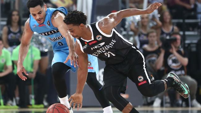 Corey Webster, left, takes on Melbourne United’s Casper Ware. Picture: Scott Barbour (Getty Images)