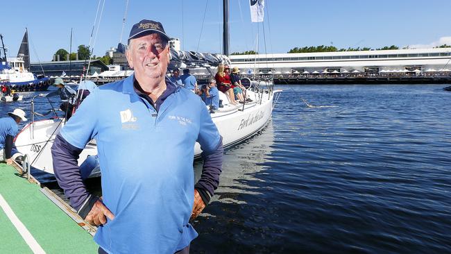 Hobart's waterfront is at capacity as sailors from the various races gather in the docks. Launceston to Hobart winner, Fork in the road, arrives in town. Captain Gary Smith is pictured in front of his yacht. Picture: MATT THOMPSON