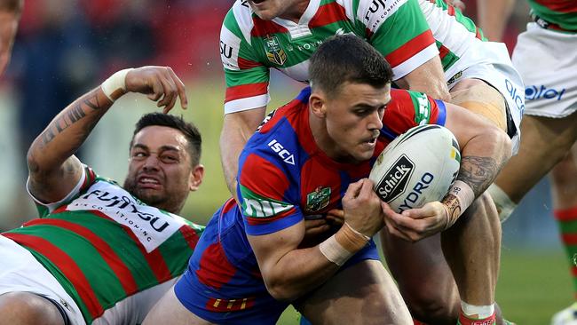 NEWCASTLE, AUSTRALIA - AUGUST 28: Dylan Phythian of the Knights scores a try during the round 25 NRL match between the Newcastle Knights and the South Sydney Rabbitohs at Hunter Stadium on August 28, 2016 in Newcastle, Australia. (Photo by Ashley Feder/Getty Images)