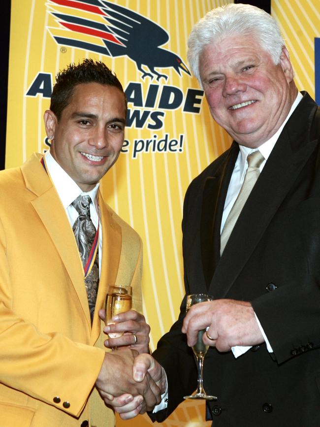 Footballer Andrew McLeod wearing the Club Champion gold jacket with chairman Bill Sanders after winning the Malcolm Blight Medal in 2007. Picture: Files