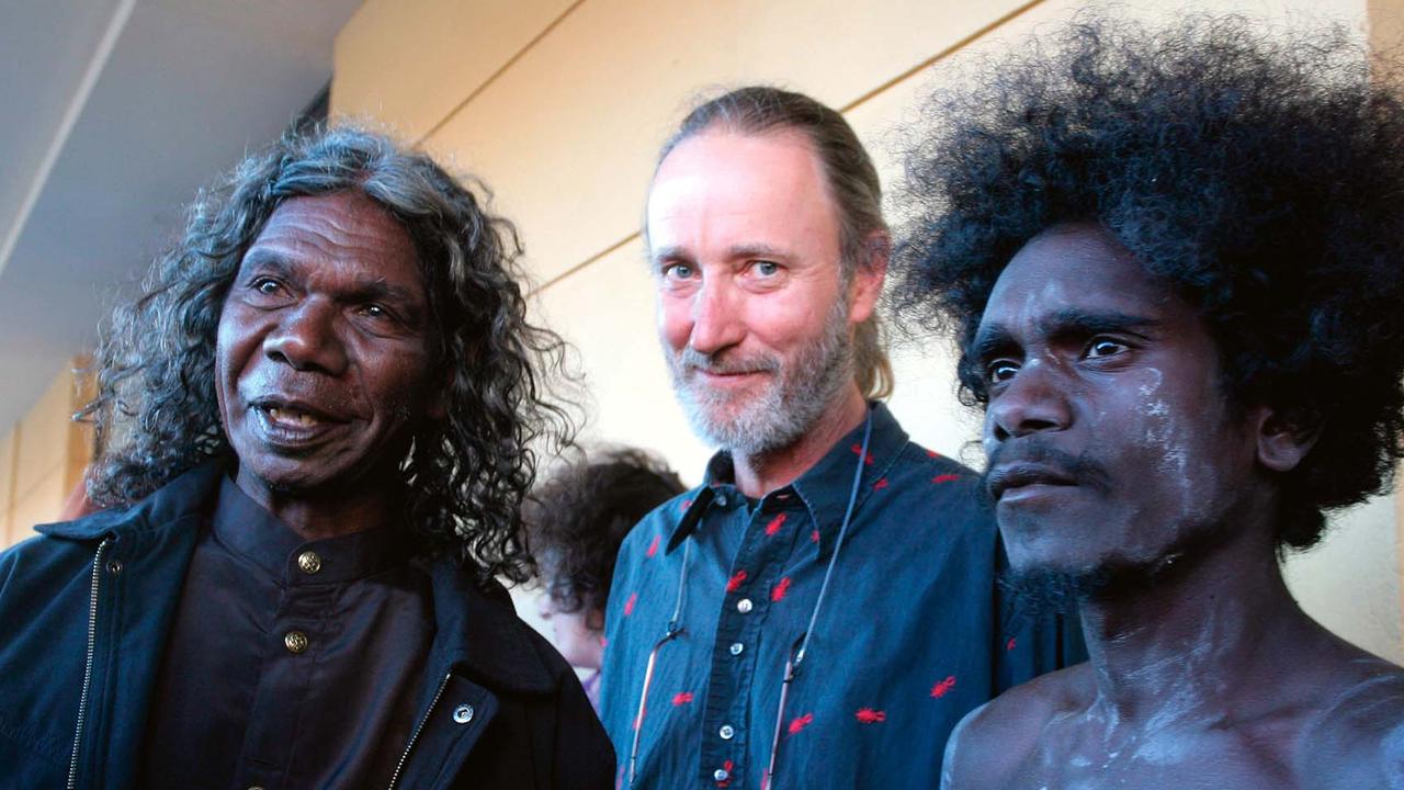 David Gulpilil and son Jamie attend the premiere of the 2006 film Ten Canoes with director Rolf de Heer. Picture: Brett Hartwig