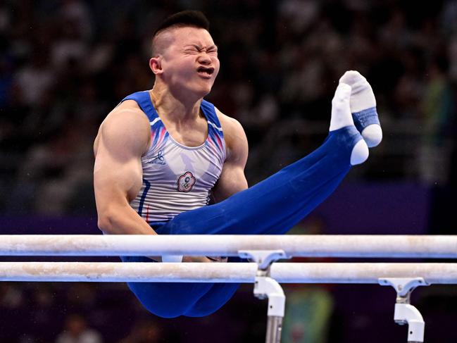 Taiwan's Guan Yi Lin competes on the parallel bars during the men's artistic gymnastics event at the Hangzhou 2022 Asian Games. Picture: William West/AFP