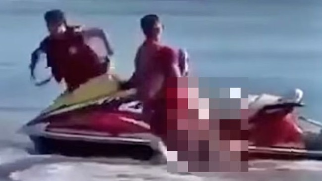 Lifeguards brought the man to shore on a jetski.