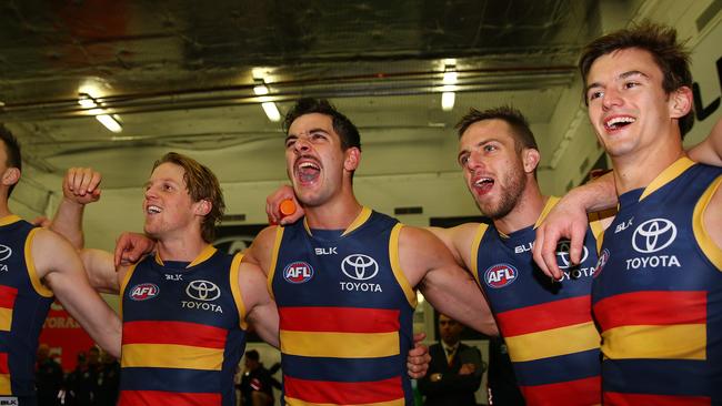 Taylor Walker and co scream out the Adelaide song. Photo Sarah Reed