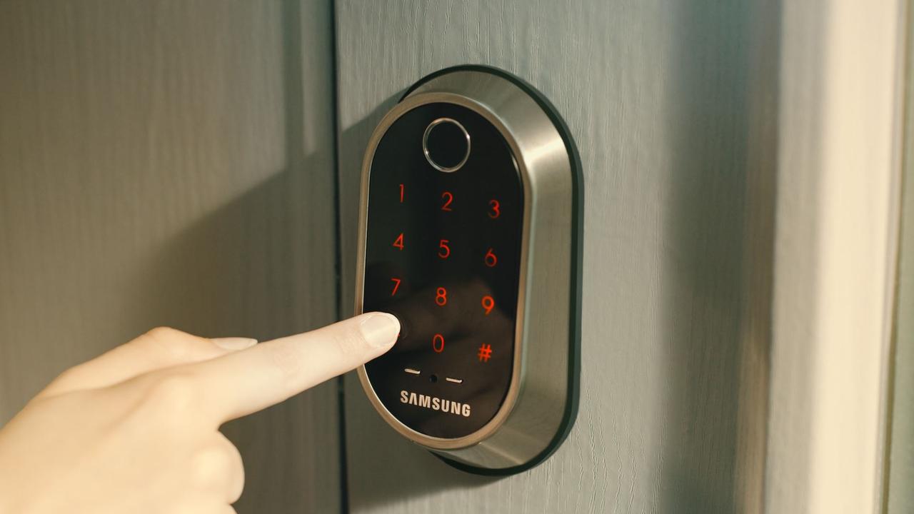 The Samsung A30 Smart Lock features a fingerprint scanner and number pad to let people in without a key.