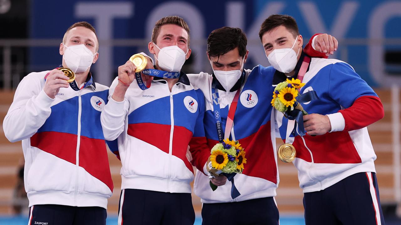 David Belyavskiy, Nikita Nagornyy, Artur Dalaloyan and Denis Abliazin of Team ROC pose with the gold medal after winning the Men's Team Final on day three of the Tokyo 2020 Olympic Games. Picture: Jamie Squire/Getty Images