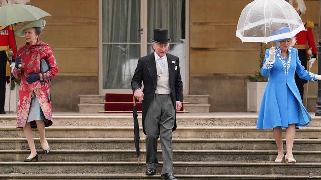 Princess Anne, Prince Charles and Camilla flocked to the slightly damp Royal Garden Party at Buckingham Palace on May 11. Picture: Jonathan Brady – WPA Pool/Getty Images