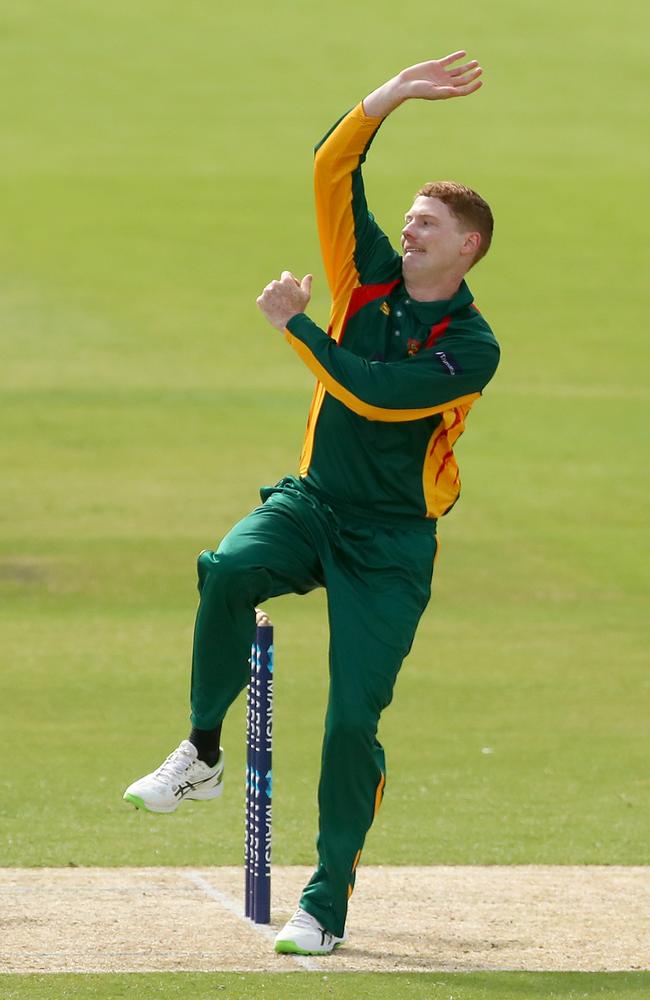 Tom Andrews of Tasmania bowls during the Marsh One Day Cup match between Victoria and Tasmania. Picture: Kelly Defina/Getty Images.