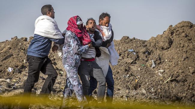 A man who lost his wife in the crash at the site in March. Picture: AP