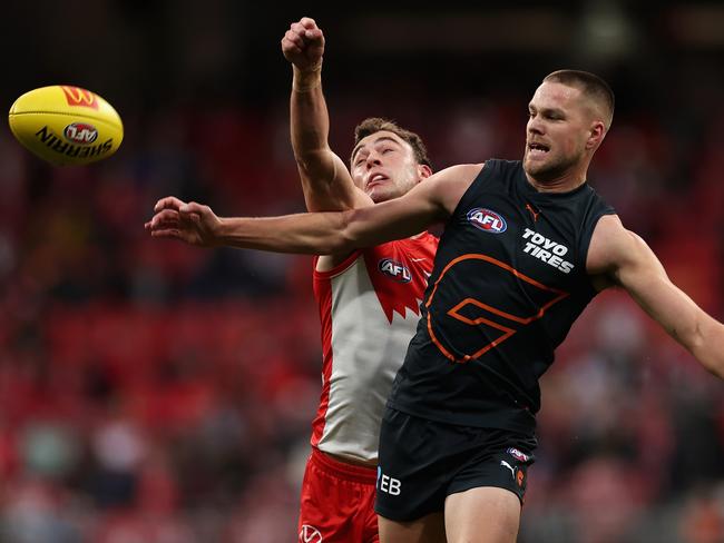 SYDNEY, AUSTRALIA - JUNE 22: Will Hayward of the Swans and Harry Himmelberg of the Giants contest the ball during the round 15 AFL match between Greater Western Sydney Giants and Sydney Swans at ENGIE Stadium, on June 22, 2024, in Sydney, Australia. (Photo by Cameron Spencer/Getty Images)