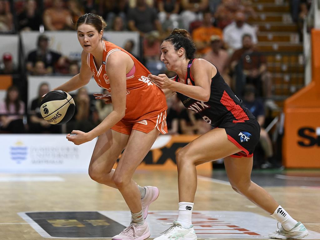 Saffron Shiels of the Fire attempts to get past Alex Ciabattoni of the Lynx during game two of the WNBL Semi Final series between Townsville Fire and Perth Lynx at Townsville Entertainment Centre, on February 26, 2025, in Townsville, Australia. (Photo by Ian Hitchcock/Getty Images)