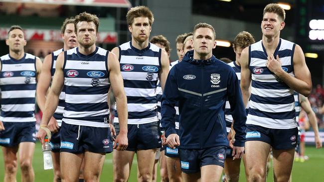 Injured captain Joel Selwood leads his team off after losing to Sydney. Picture: Michael Klein