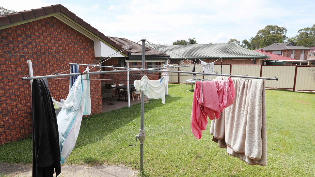 Faded washing hanging on the clothesline in the backyard. Photographer: Liam Kidston