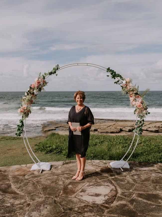 Yamba wedding celebrant Christine Preston in happier times at Green Point. She is upset people have vandalised the spot she calls a sacred place. Photo: Wallflower Weddings