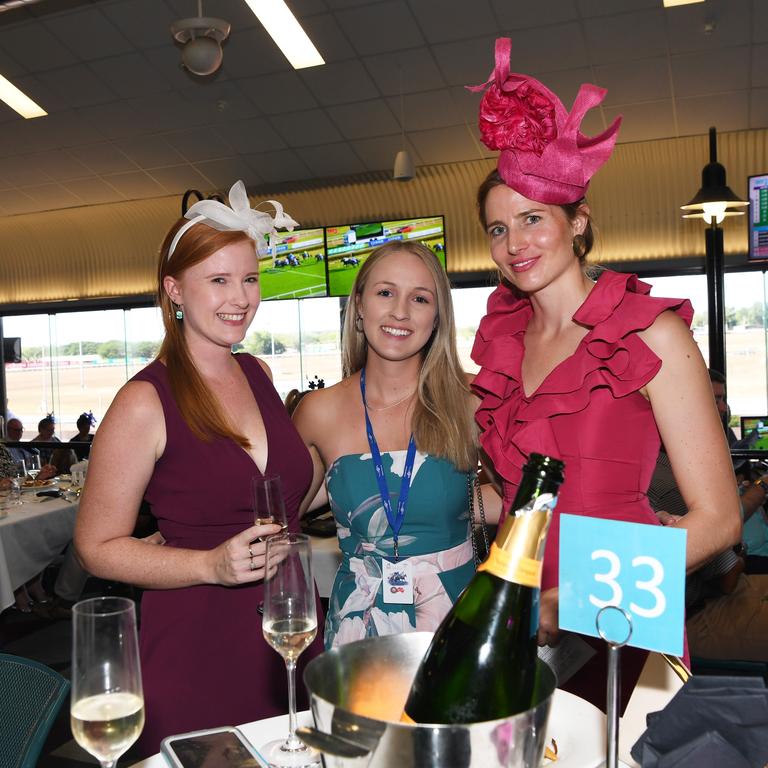 Nicole Festing, Jasmin Lamont and Freya Nulvey at the Darwin Turf Club Bridge Toyota Ladies' Day / Derby Day. Picture: KATRINA BRIDGEFORD